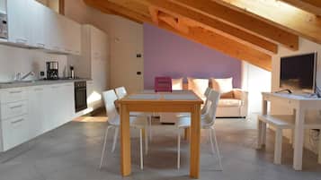 Apartment, 1 Bedroom | Living area | Flat-screen TV