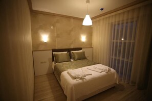 Suite | Minibar, caja fuerte, escritorio y sistema de insonorización