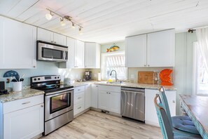 Fridge, microwave, oven, stovetop - Charming Historic Cottage in Downtown Kure Beach: A 2 Minute Walk to Ocean Bliss (Kure Beach)