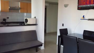 Apartment, 2 Bedrooms | Living area | Flat-screen TV