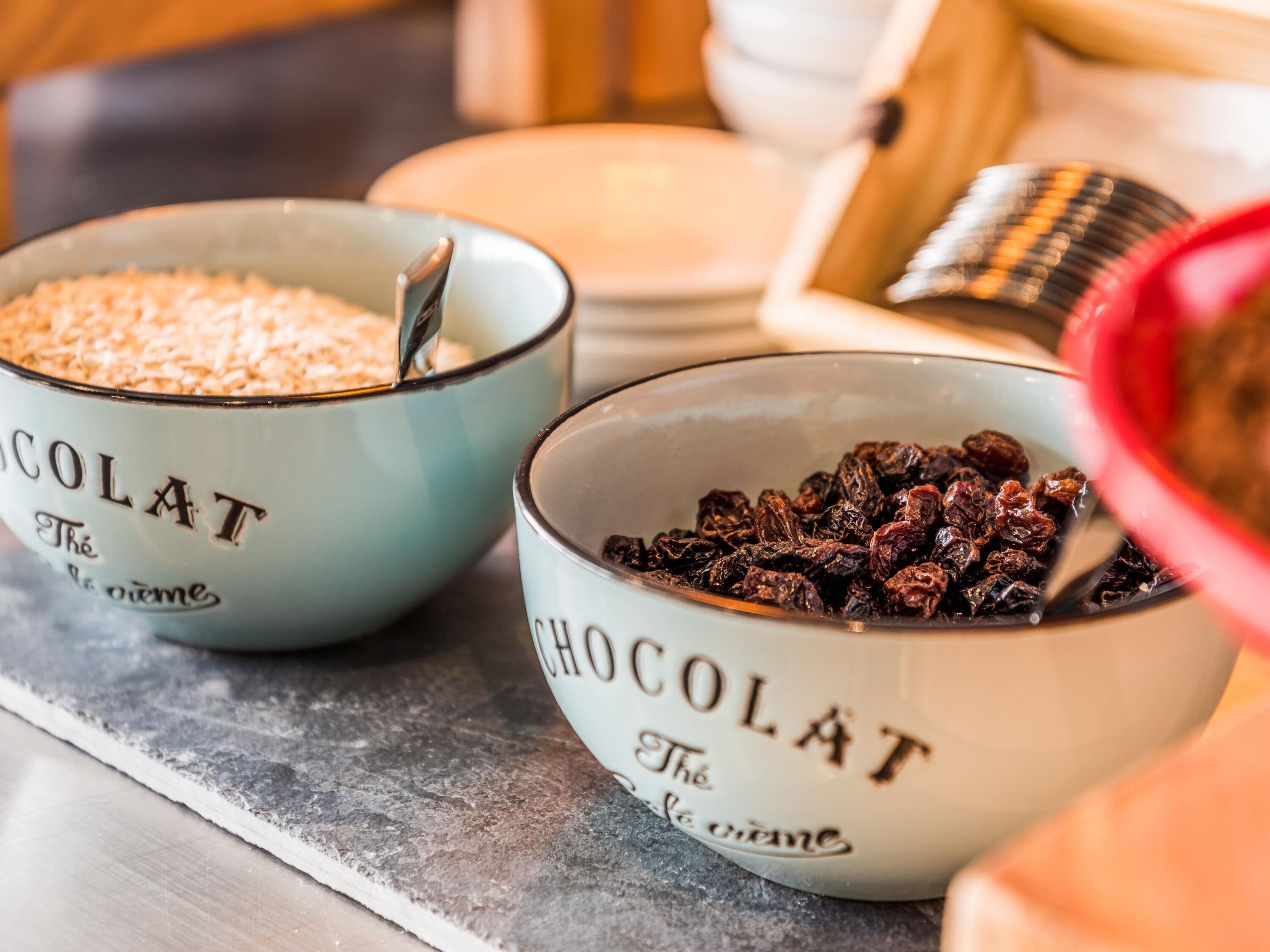 Two bowls labeled 'CHOCOLAT' on a countertop.