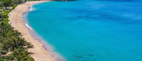 On the beach, sun loungers, beach towels