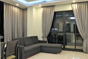 Apartment, 1 Bedroom | Living area | LED TV