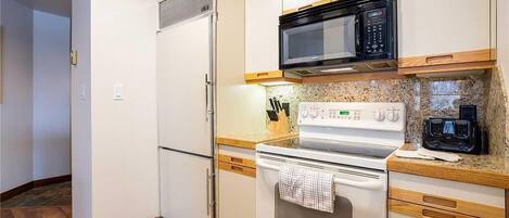 Appartamento, letti multipli (1203 Trappeur's Lodge, Trappeur's Cro) | Cucina privata | Frigorifero, microonde, forno, piano cottura