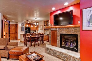Apartment | Living area | TV, fireplace - 1206 Trappeur's Lodge, Trappeur's Crossing Apartment 2 (Steamboat Springs)