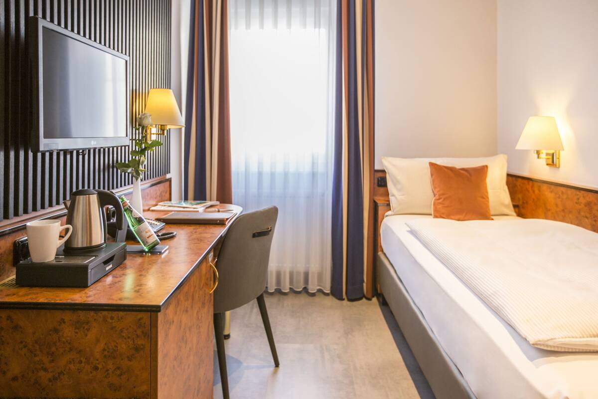 Premium bedding, free minibar items, in-room safe, desk