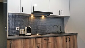 Studio Deluxe, cuisine, vue ville | Coin cuisine privé