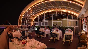 Breakfast, lunch served; local and international cuisine, pool views