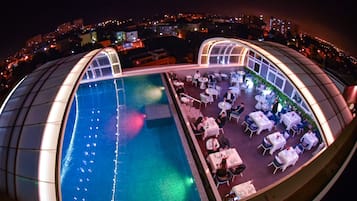 Breakfast, lunch served; local and international cuisine, pool views