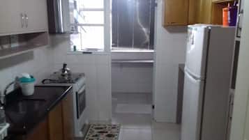 Quarto básico, 2 quartos | Cozinha privada | Geladeira, fogão, cooktop, cadeirão de bebê