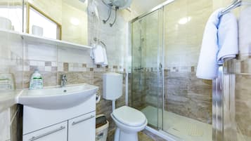 Standard Double Room, Garden View | Bathroom | Shower, hair dryer, towels