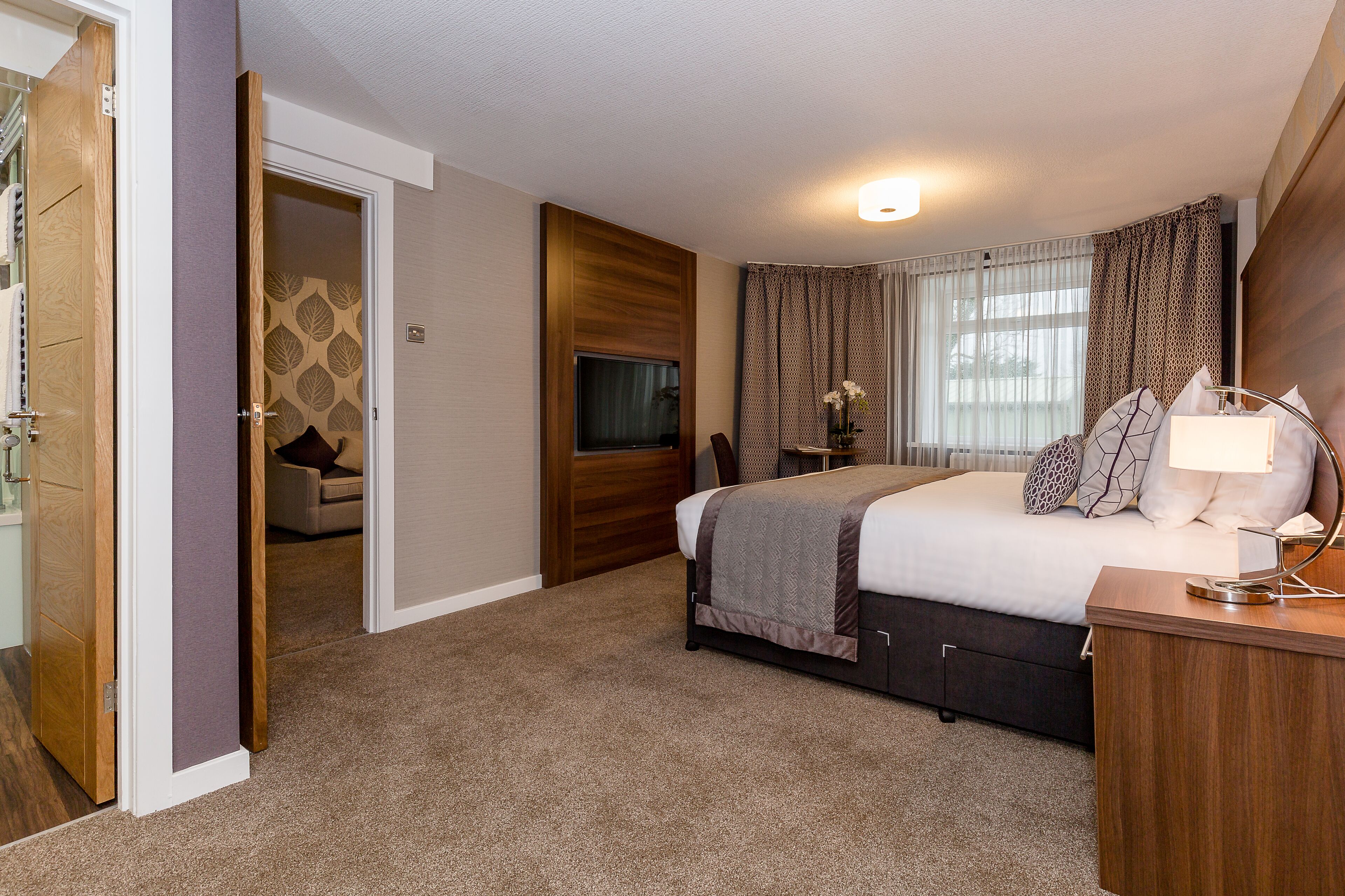 luxury suite | 1 bedroom, premium bedding, blackout curtains, iron/ironing board