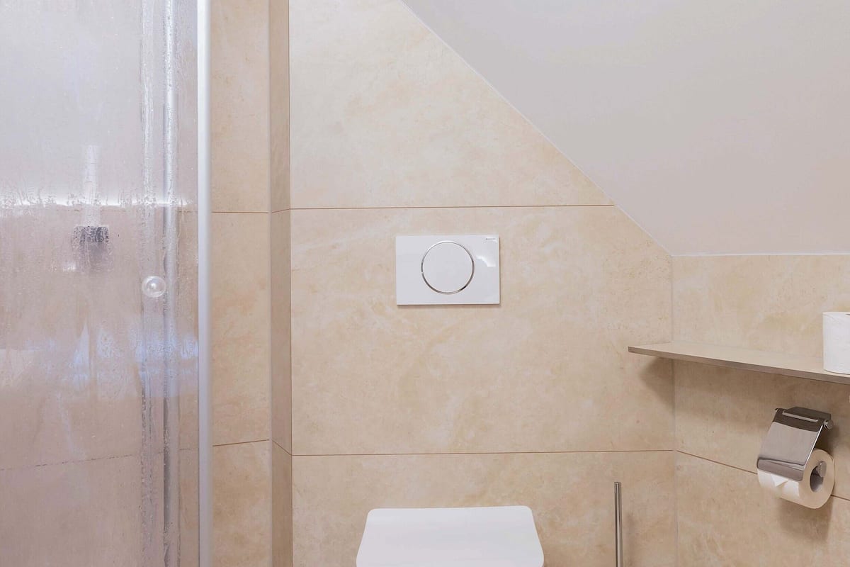 shower, rainfall showerhead, hair dryer, towels