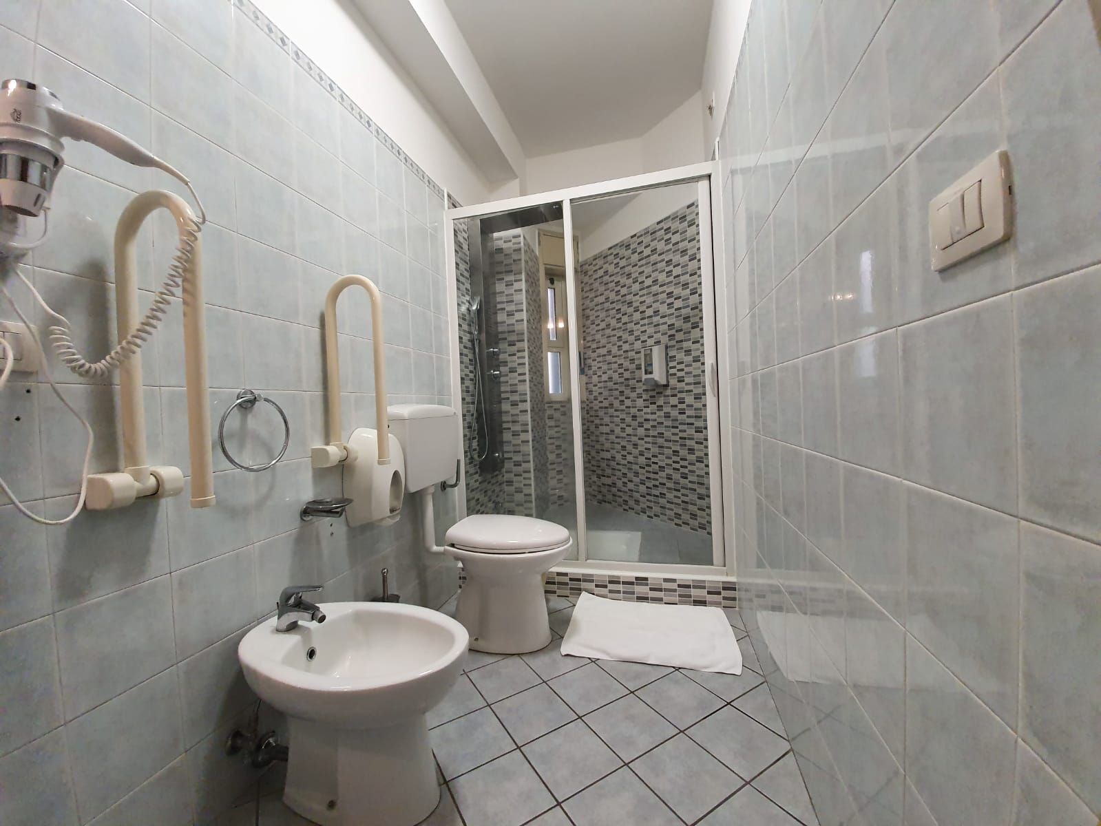 comfort triple room | bathroom | shower, hair dryer, bidet, towels