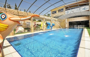 Seasonal outdoor pool, pool umbrellas, pool loungers