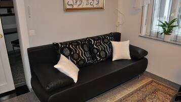 Superior Apartment, 1 Bedroom, Non Smoking, Kitchenette | Living area | 80-cm flat-screen TV with satellite channels, TV, heated floors