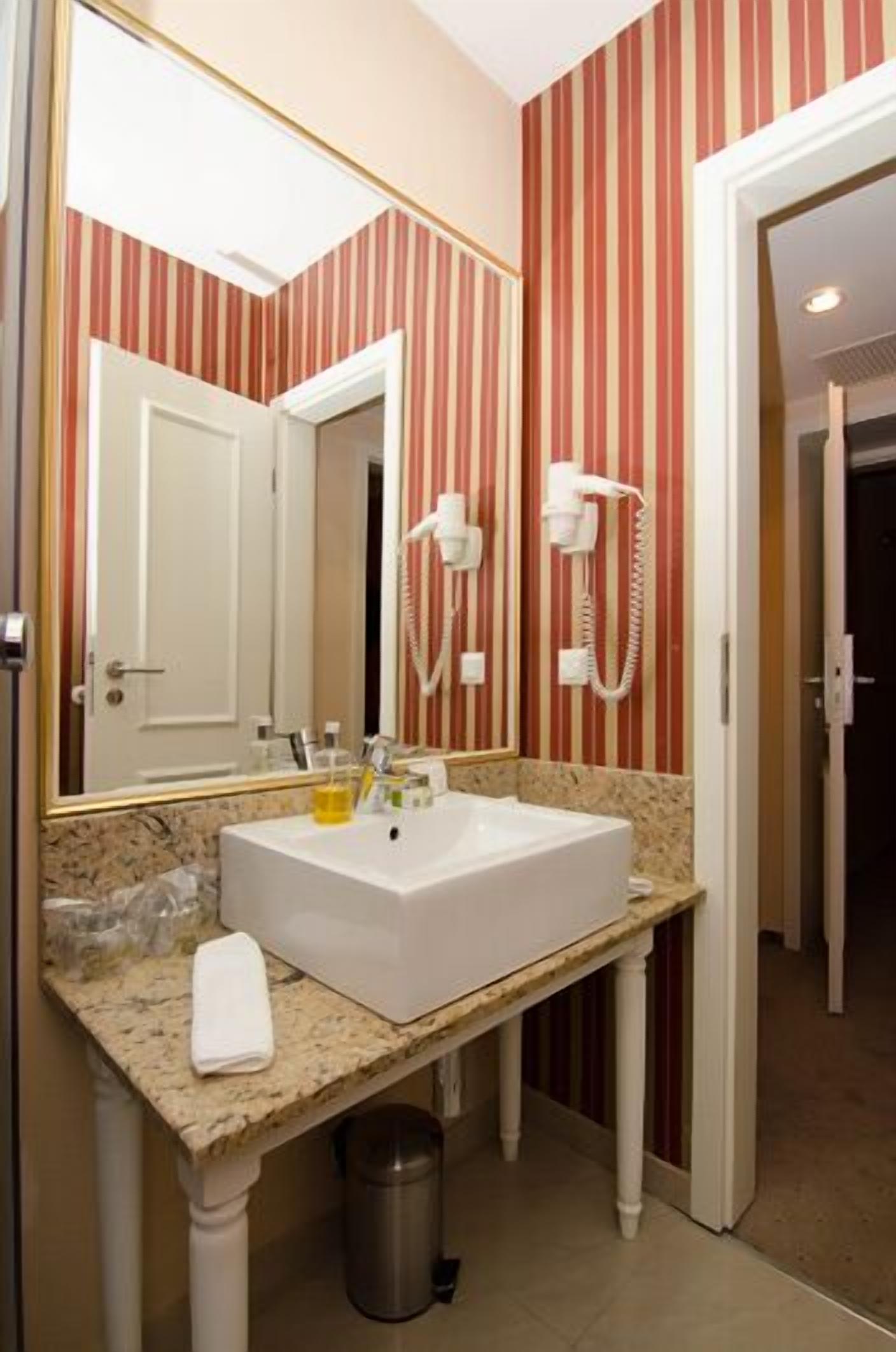 superior double room | bathroom | shower, free toiletries, hair dryer, slippers