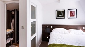 Suite Junior | 1 chambre, literie de qualité supérieure, bureau, rideaux occultants