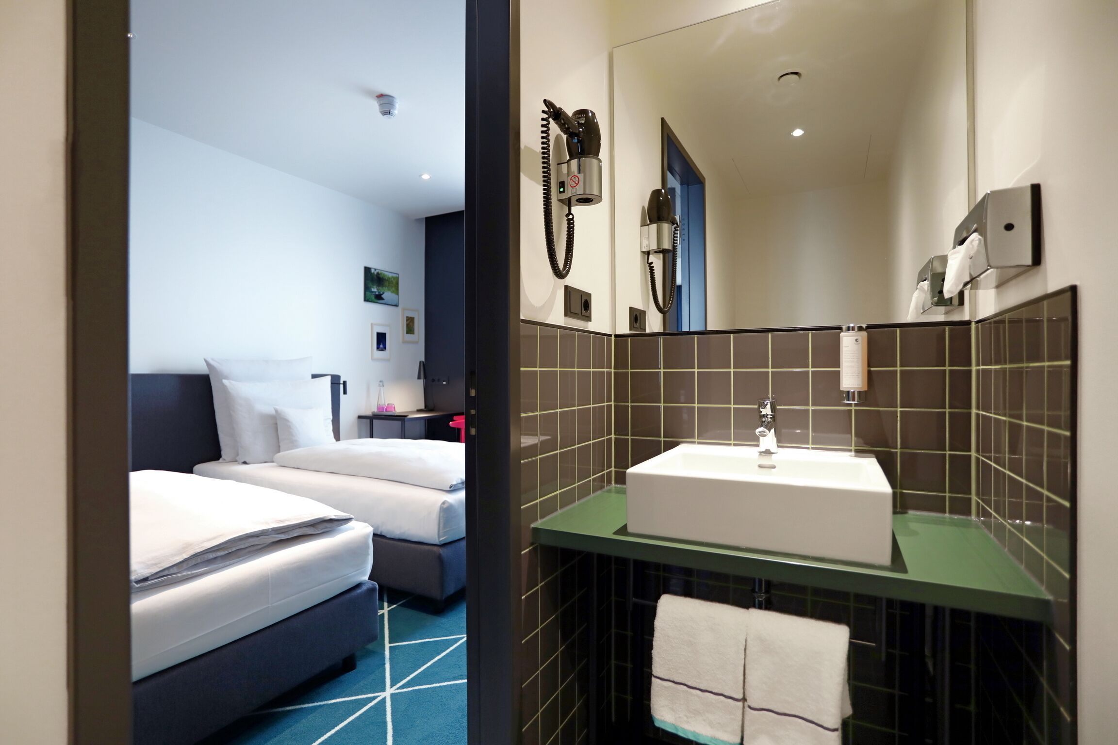 shower, free toiletries, hair dryer, towels