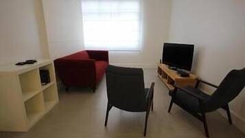 Apartamento standard, 2 quartos | Área de estar