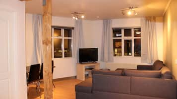 Comfort appartement, 2 slaapkamers | Woonkamer | Een flatscreentelevisie en Netflix