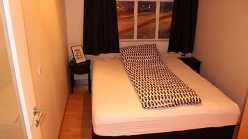 Apartamento Confort, 2 habitaciones | 1 dormitorio, cortinas opacas, wifi gratis y ropa de cama