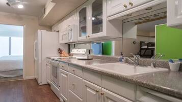 Luxury Condo, 2 Bedrooms, Private Bathroom | Private kitchen | Full-size fridge, microwave, oven, dishwasher