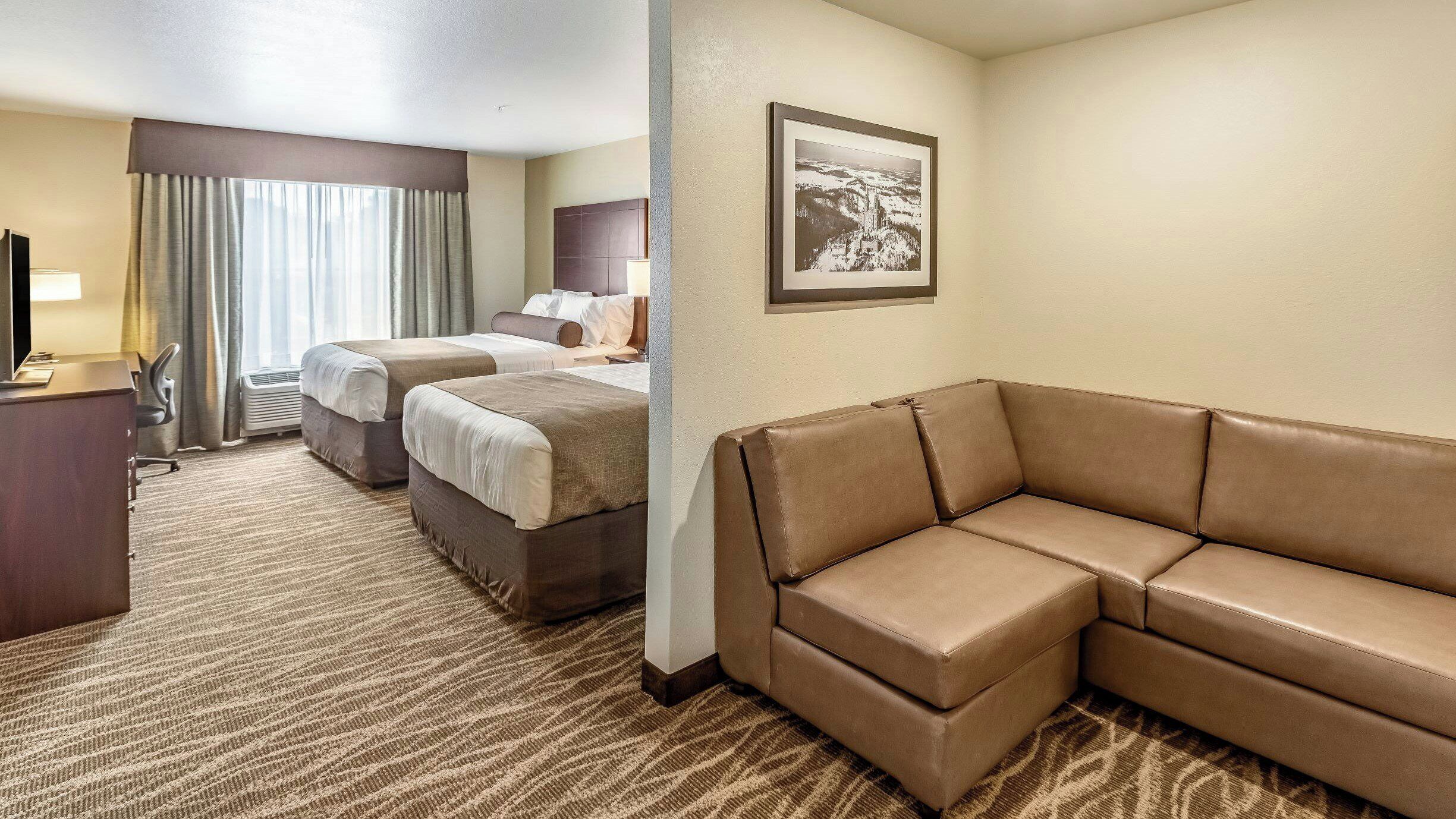 Premium bedding, down comforters, pillowtop beds, in-room safe