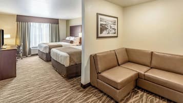 Premium bedding, down comforters, pillowtop beds, in-room safe