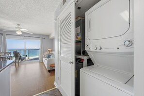 Exclusive Condo, 1 Bedroom, Balcony, Beach View | Laundry - Tradewinds Condos by Hosteeva (Orange Beach)