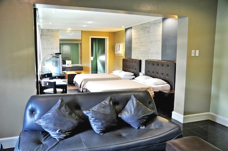 Penthouse, 2 Double Beds | Living area | TV