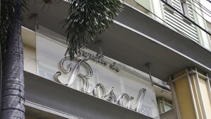 A building facade with a sign that reads "Boutique de Rosal". - Jardin de Rosal Hotel (Pasig)