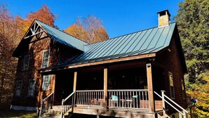 A wooden cabin with a porch and steps leading up to it. - Upscale Mount Snow/Stratton Area w/Indoor Pool access, short drive to lakes  (West Wardsboro)