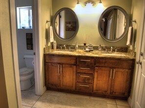 Combined shower/tub, hair dryer, towels, soap