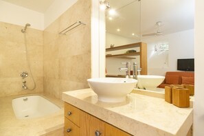 Bathtub, hair dryer, towels