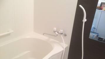 Apartment, 1 Bedroom | Bathroom | Combined shower/bathtub, free toiletries, hair dryer, bidet