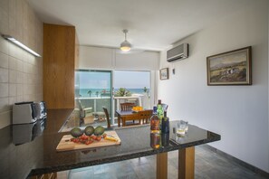 Apartment, 1 Bedroom, Pool Access | Living area | Flat-screen TV - Lordos Sunshore Beachfront Suite (Oroklini)