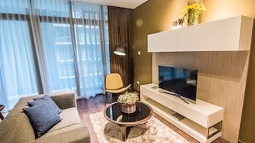 Apartment, 1 Bedroom | Living room | LCD TV