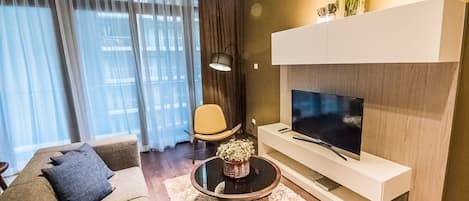 Apartment, 1 Bedroom | Living room | LCD TV