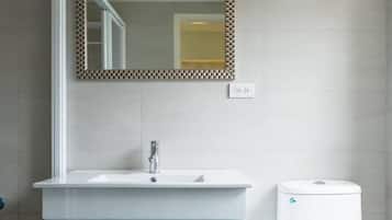 Shower, free toiletries, hair dryer, slippers