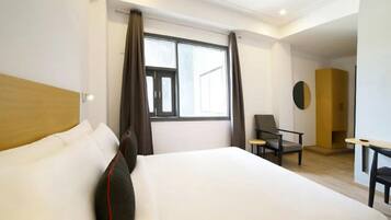 Premium bedding, individually decorated, desk, laptop workspace