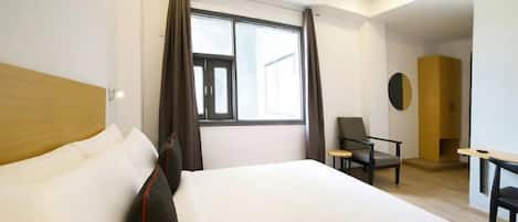 Premium bedding, individually decorated, desk, laptop workspace