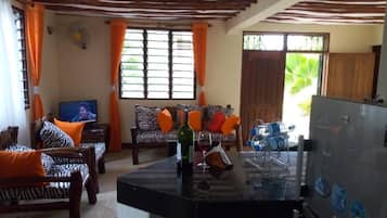 40-inch flat-screen TV with cable channels, TV