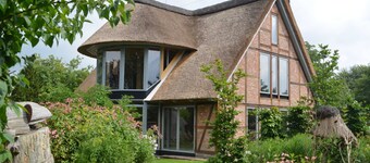 Owl tower - thatched aspen house