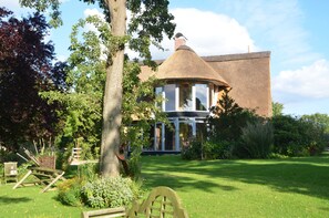 Unclassified image, 2 of 15, button - Owl tower - thatched aspen house (Grebin)