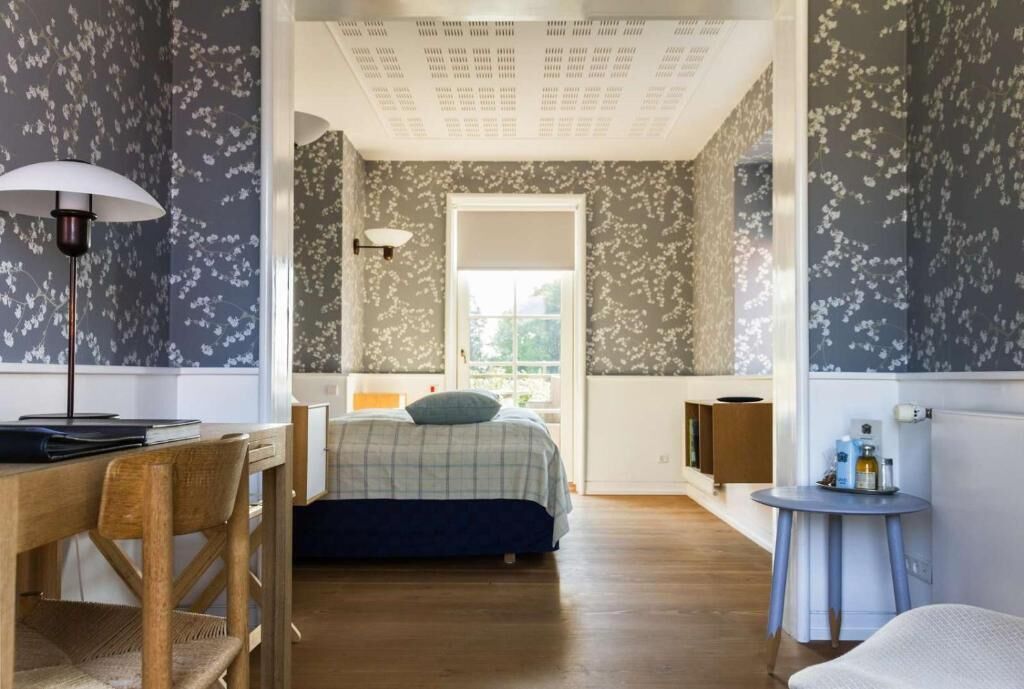 estate room | in-room safe, individually decorated, desk, blackout curtains