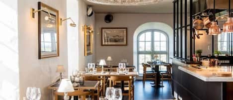 2 restaurants, breakfast, lunch, dinner served; local cuisine