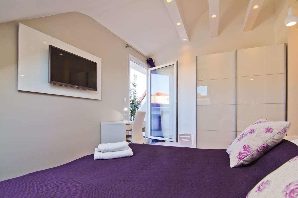 Suite estudio, Terraza | Ropa de cama de alta calidad y caja de seguridad en la habitación