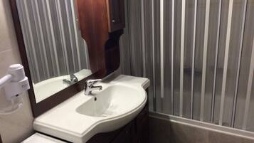 Shower, free toiletries, hair dryer, towels