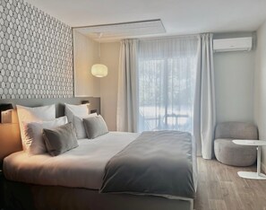 1 habitación, ropa de cama de alta calidad y minibar 